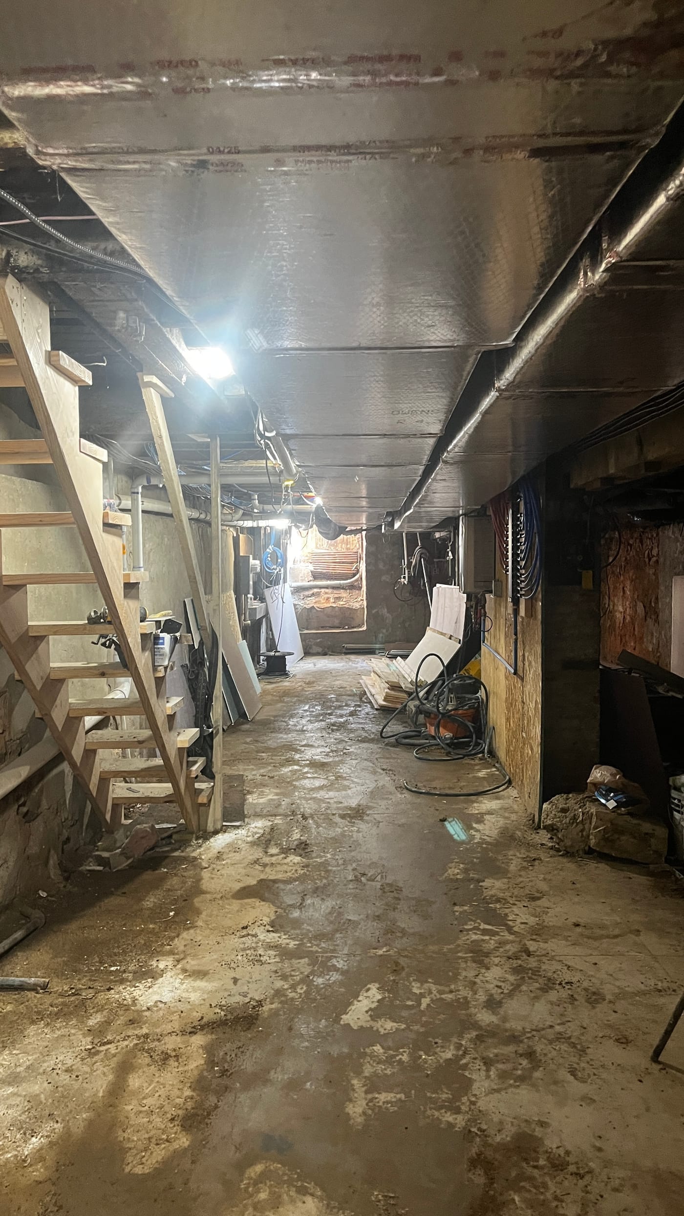 Empty clean basement with bare concrete floor